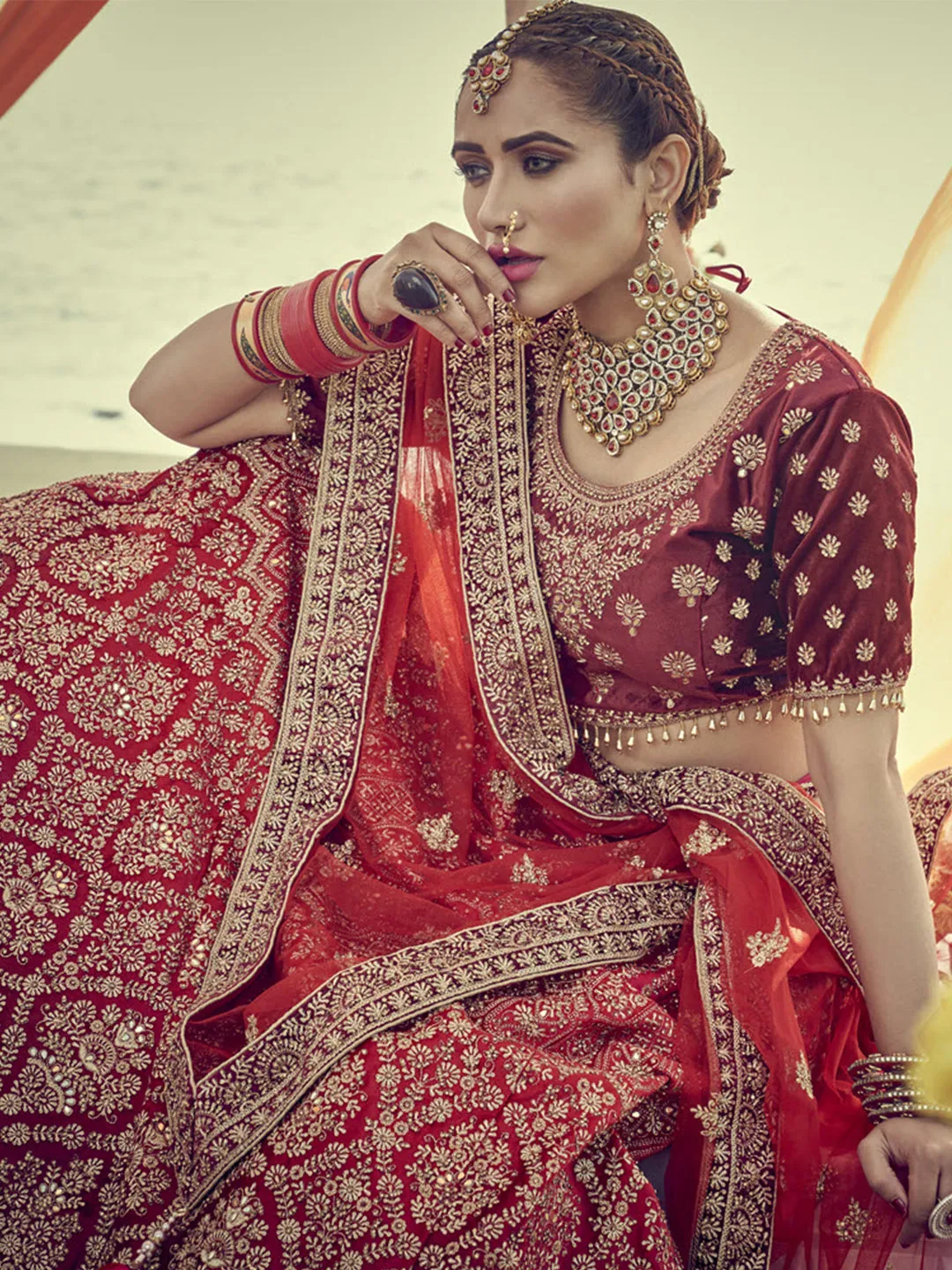 A beautiful maroon micro velvet lehenga skirt with 3d handcrafted blouse & net duppatta