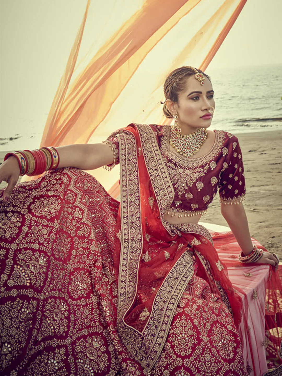 A beautiful maroon micro velvet lehenga skirt with 3d handcrafted blouse & net duppatta