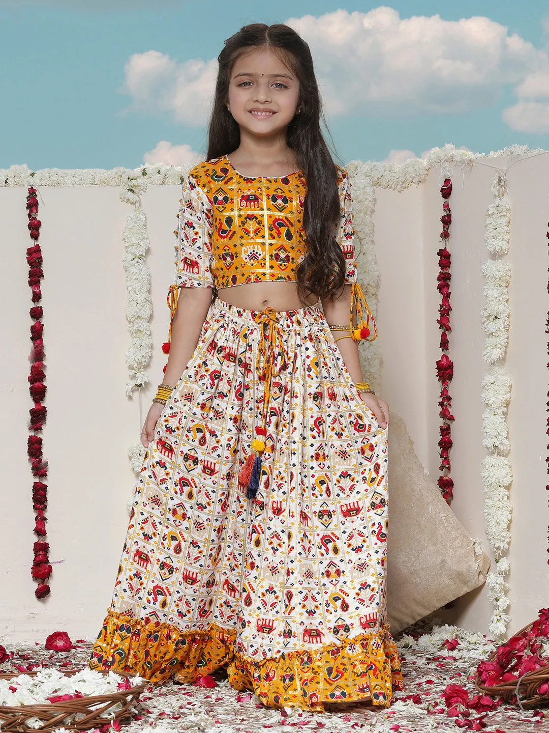 Jashvi Girls' Yellow And Cream Patola Print Lehenga Set