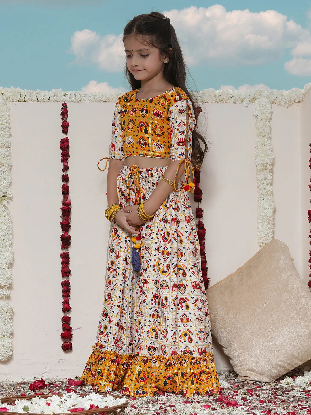 Jashvi Girls' Yellow And Cream Patola Print Lehenga Set