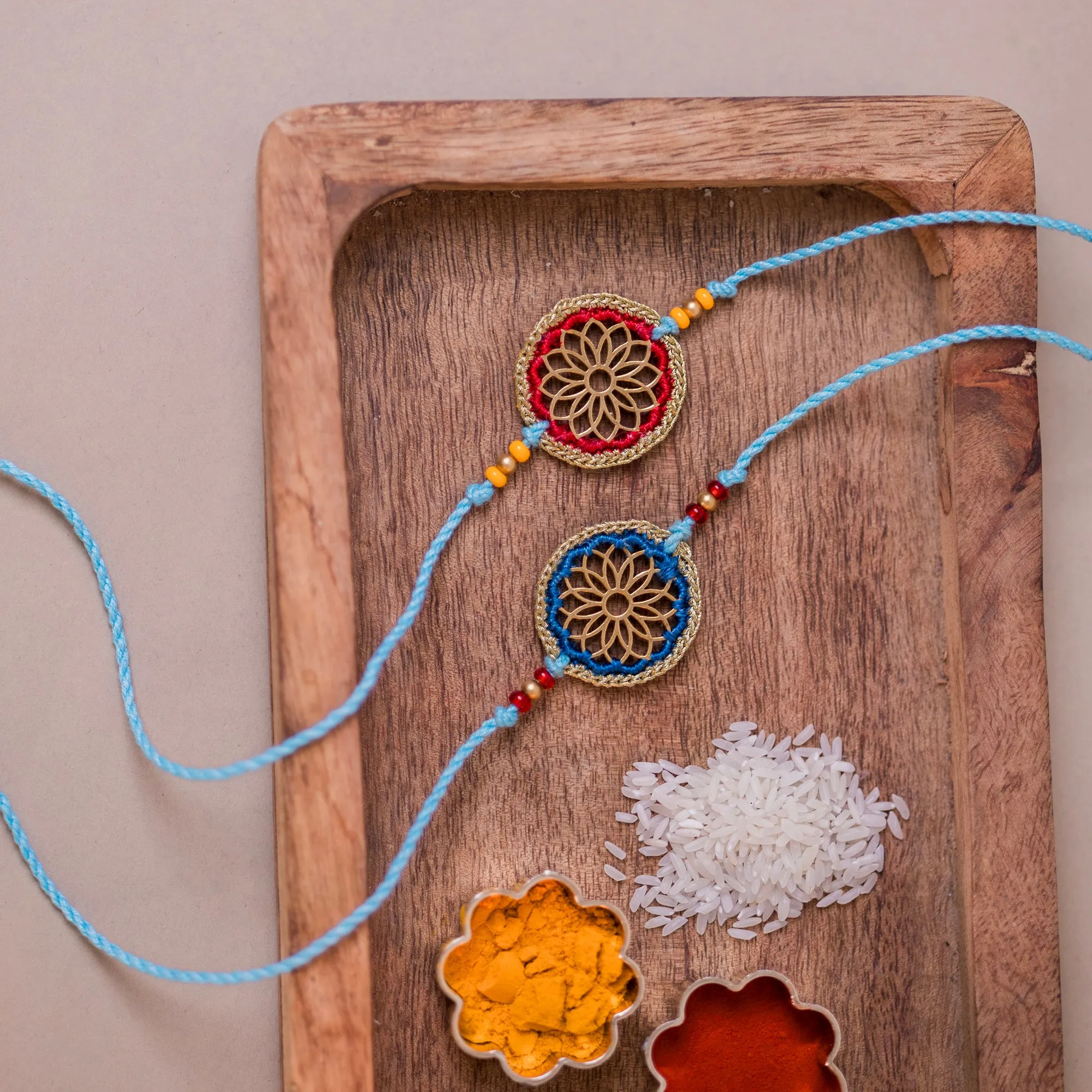 Red & Blue Sunshine Chakra Rakhi (Set of 2)