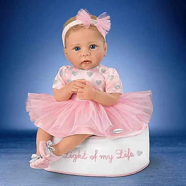 The Ashton - Drake Galleries Light of My Life So Truly Real® Lifelike Baby Girl Doll with Light Up Skirt and Ottoman Set Weighted Poseable RealTouch® Vinyl Skin by Doll Artist Linda Murray 18-inches